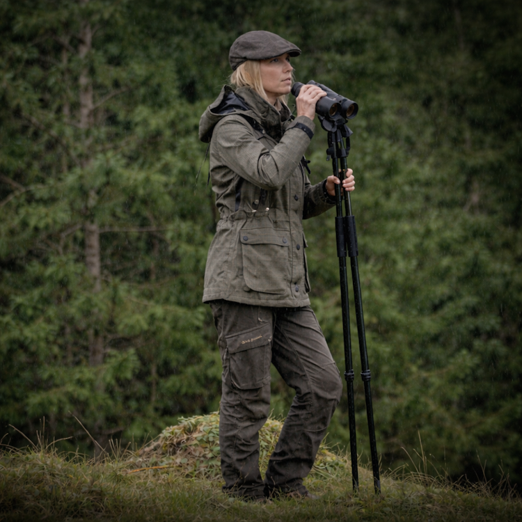 Woman wearing a Deerhunter Ladies Gabby Jacket standing in a wooded area